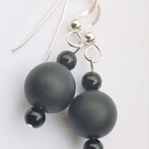 2 black collection earrings