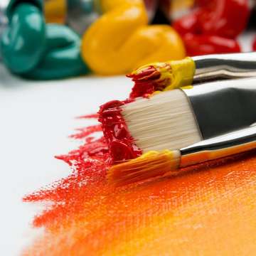 Paint brushes with paint on them by anna kolosyuk
