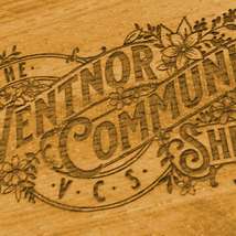 Ventnor community shed logo on wood   coloured brown 