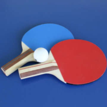 Table tennis ball and bats by lisa keffer