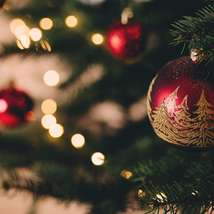 Close up of christmas tree with glittery baubles by freestocks