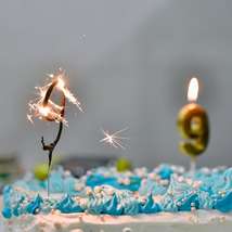 Birthday cake with 9 candles on it by shraga kopstein